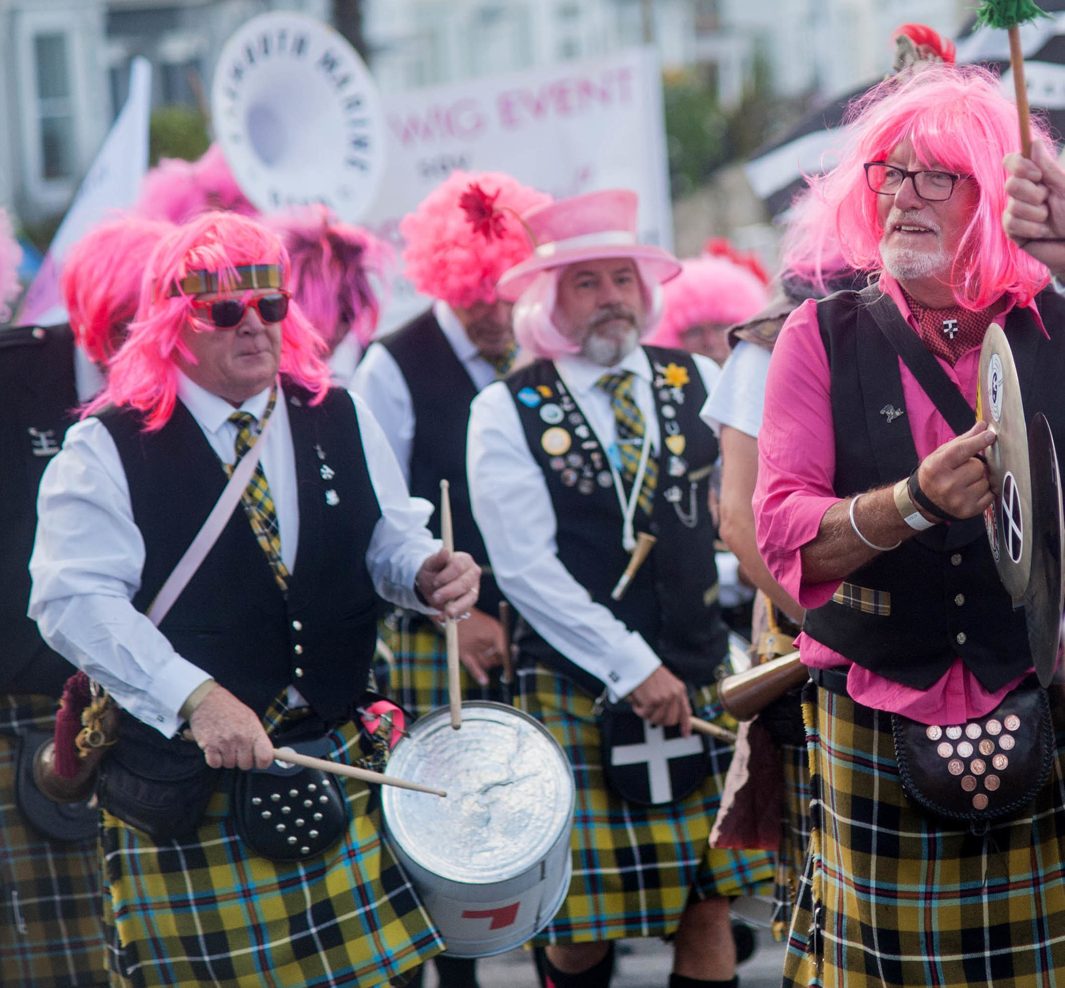 Falmouth Pink Wig Parade from the Greenbank Hotel to Church Street car park on Friday evening: The Falmouth Marine Band lead the parade. Picture by Colin Higgs