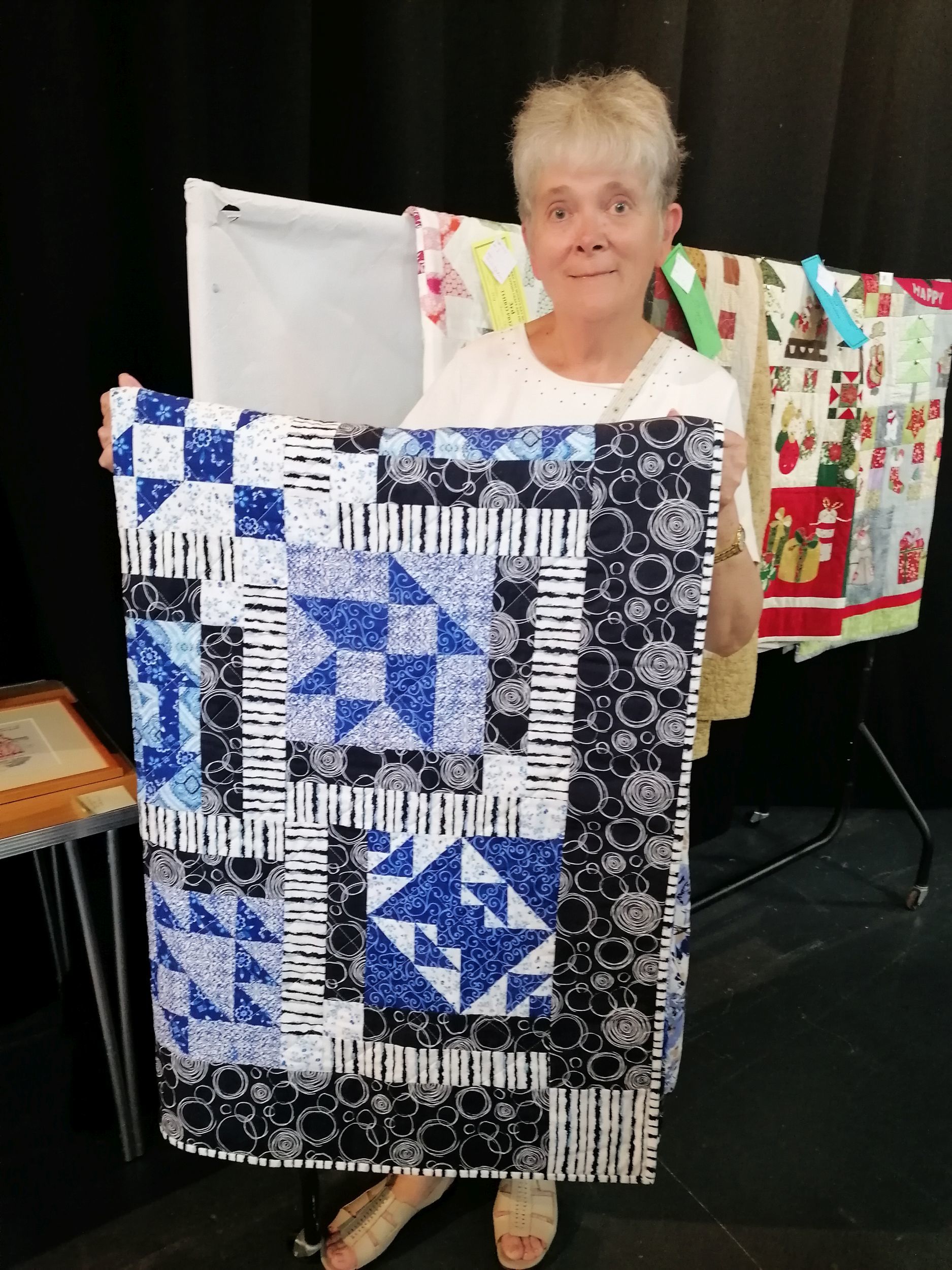 Janet Steadman and her prize-winning quilt