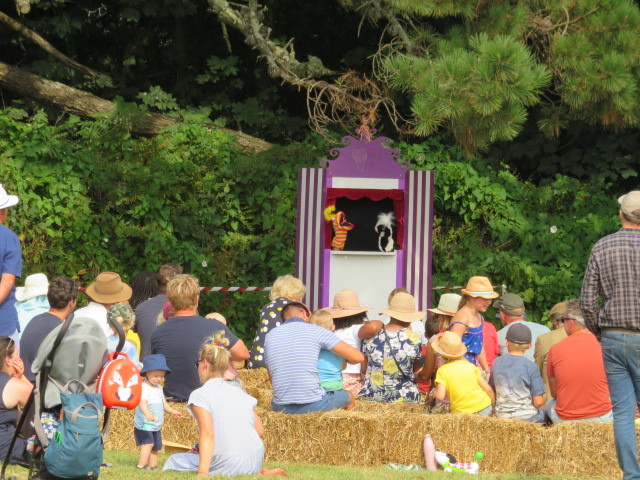 The puppet show for the all ages in on the playing field. 