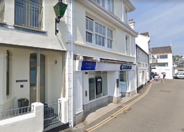 Falmouth Packet: This property in Marine Parade, St Mawes offers the opportunity to convert a bank into a home. Picture: Google Street View