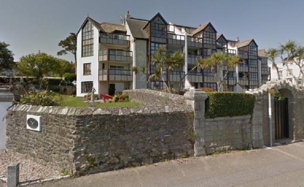 Falmouth Packet: This apartment in Cliff Road, Falmouth offers breathtaking views. Picture: Google Street View. Picture: Google Street View