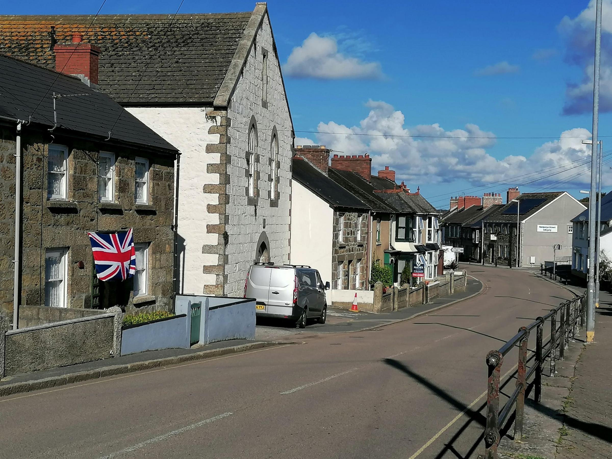 Meneage Street in Helston was empty at 10.30am, with one house displaying the Union Flag