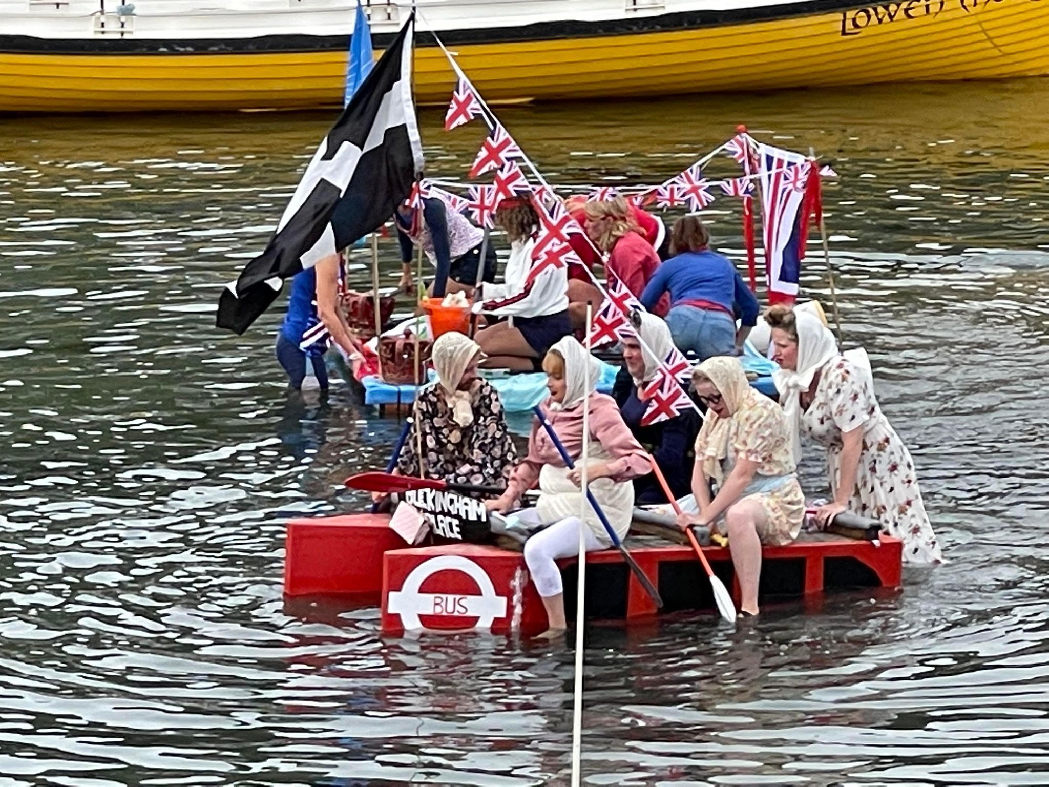 A London bus themed raft with another behind Picture: James Kitto