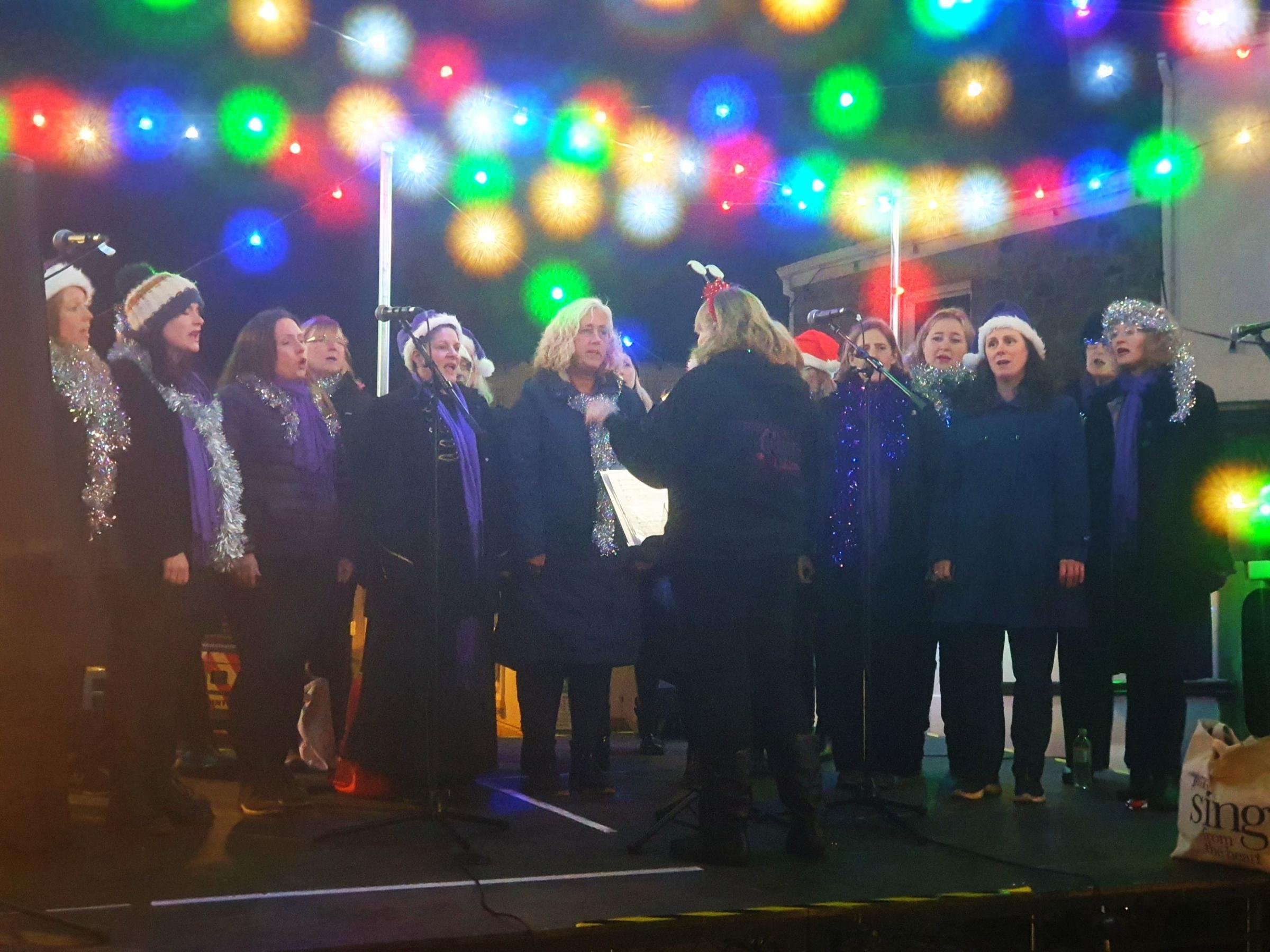 Culdrose Military Wives Choir sing on stage Picture: Emma Ferguson