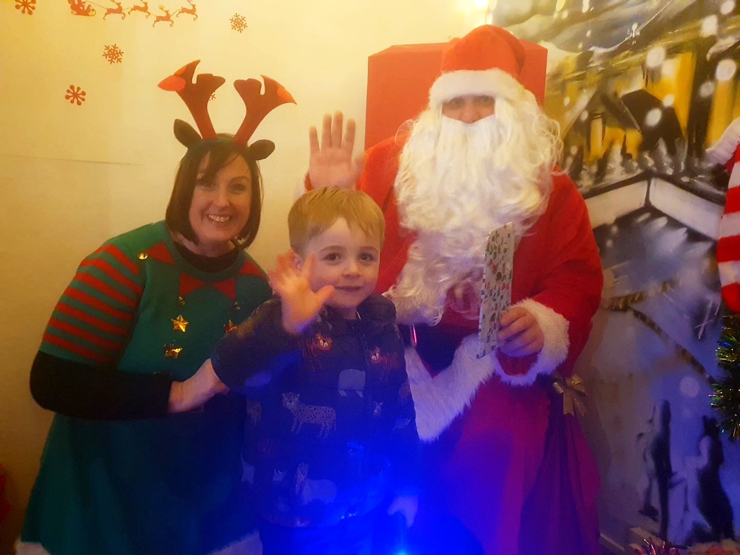 Alfie-James meets Santa and his elf Picture: Emma Ferguson
