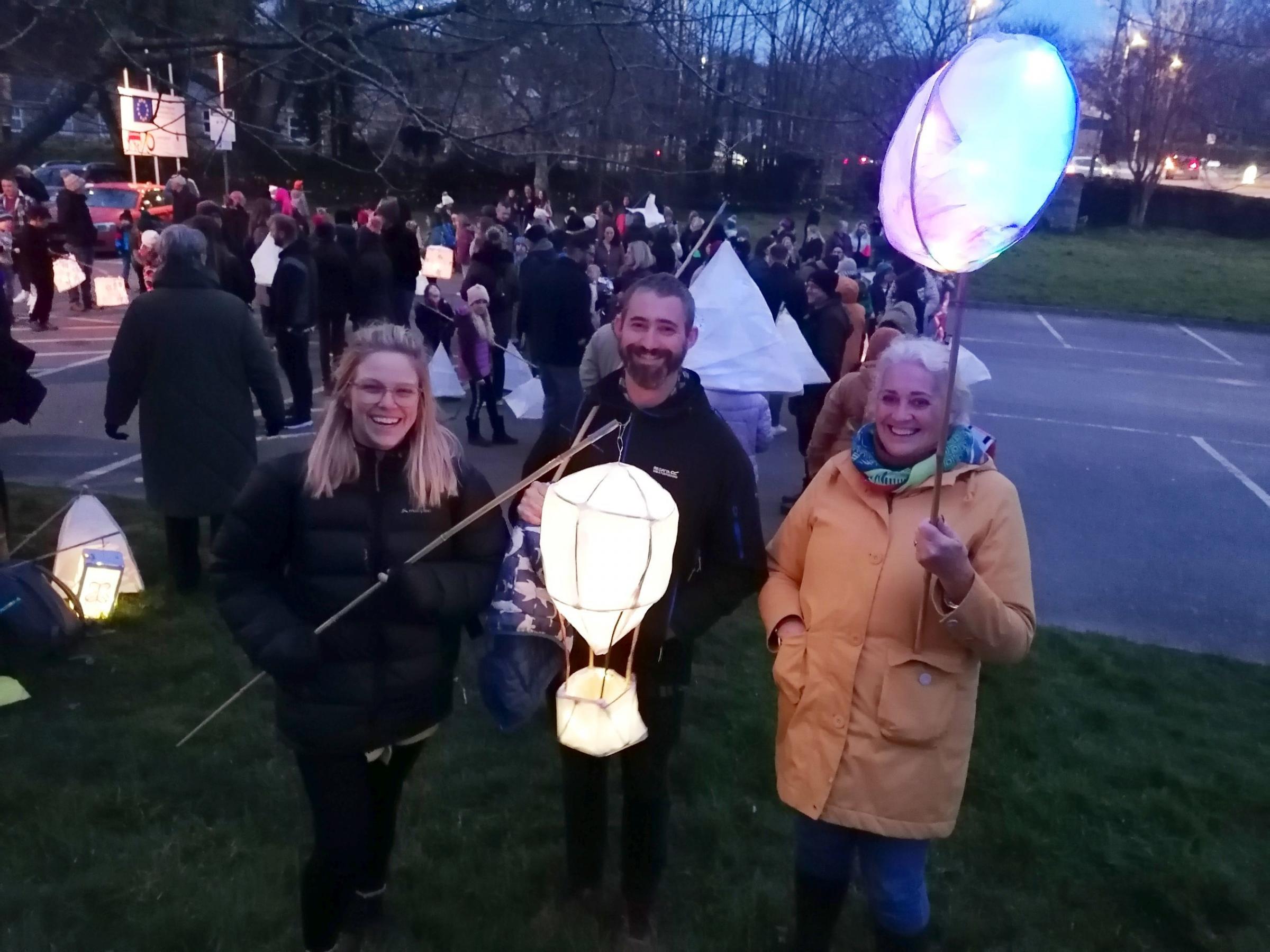 Susie Porter, with a lantern made by Tegan, is joined by Joel Bryant and Kelly Kellie