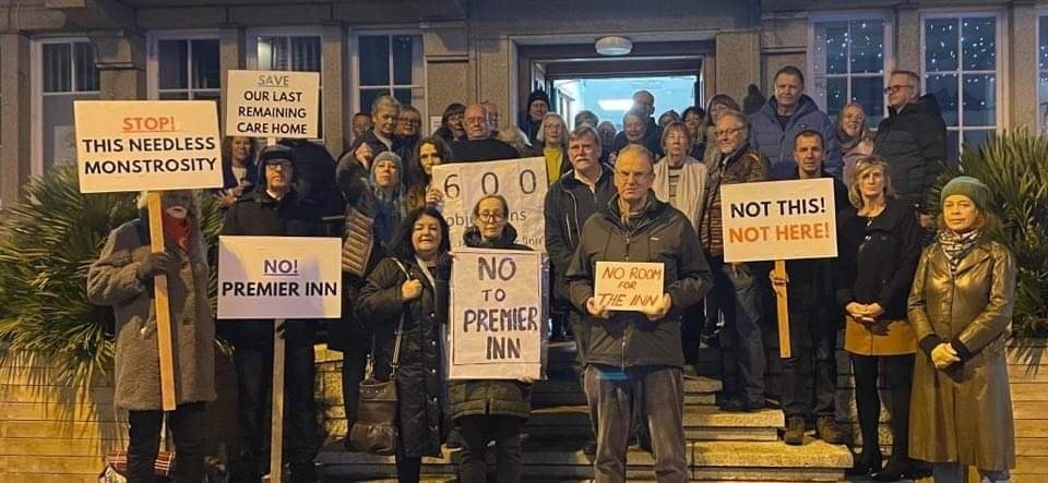 Protesters make their feelings known about the Premier Inn plans in the council chamber 