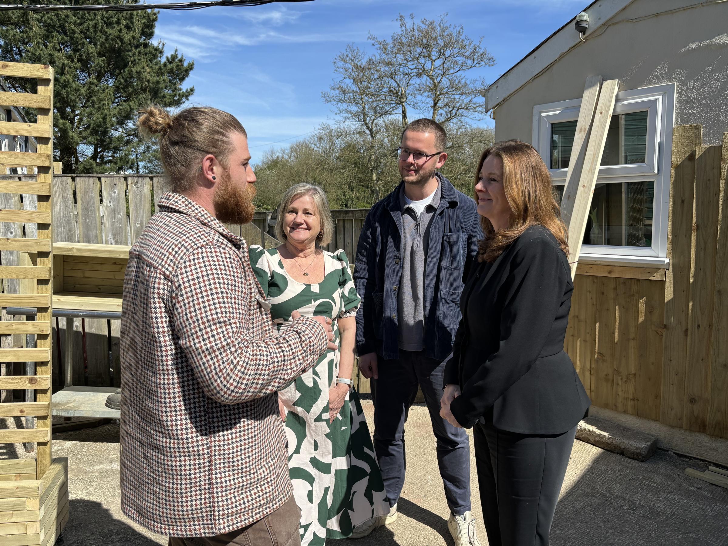 Education Secretary Gillian Keegan chats to Naturally Learning\s Tom Richardson alongside Mandy Richardson and the Conservative parliamentary candidate for Camborne and Redruth, Connor Donnithorne (Pic: Lee Trewhela / LDRS)