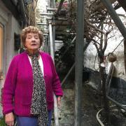 Pat Plumbridge in her garden at her home in Newlyn when it was blocked with scaffolding  Picture: LDRS/Richard Whitehouse
