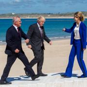 Boris Johnson and his wife Carrie welcome Prime Minister of Australia Scott Morrison to Carbis Bay, Cornwall, June 21 2021 Access to the photocall point was via a bridge (out of shot) that was built without permission. Picture SWNS
