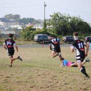 Toby Duncan breaks away for Falmouth against Tiverton