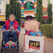 Elliott Furse, from Gulval in Cornwall, at Legoland where he switched on the Christmas lights  Picture: Samantha Brownfield-Furse