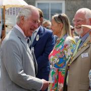 Prince Charles shares a joke with Penzance mayor Jonathan How and consort Lesley Bradley  Picture: Greg Martin / Cornwall Live