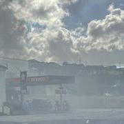 This picture by Caleisha Ann-louise Capon shows smoke billowing past the Texaco petrol station