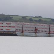 The Bibby Stokholm barge arriving in Falmouth in May