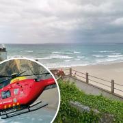 A man has died at Porthminster Beach in Cornwall despite the efforts of emergency services