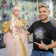 Duana AJ with his doll collection in Truro