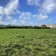 The land where the houses will be built alongside Hayle Football Club (Cornwall Council)