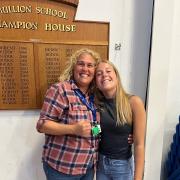 Erin Freeman from Mullion School, pictured with one of her teachers Sam Bunyan, did 'amazingly well' says her mum Anna, passing all eight subjects which now means she can go on to Truro college to study in September