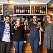 Cheers! The team celebrates to launch of the partnership between St Austell Brewery and Olio.