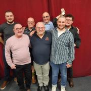 The six brave men with their freshly shaved heads - and one with smooth legs!
