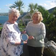 Sally receiving the Freddie Rowe trophy from the present CDA Chair - Soozie Tinn