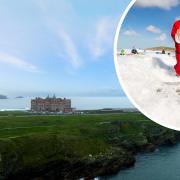Santa enjoys the surf at Fistral after delivering a 12-foot Christmas tree to The Headland Hotel