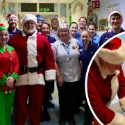 Royal Cornwall Hospital staff and sailors from RNAS Culdrose join Father Christmas and his elf for a picture