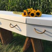 A cardboard coffin is one way to make a funeral 'greener'