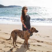 Cllr Zoe Young with her dog on Gyllyngvase Beach last year