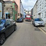 The pictrue Falmouth Fire Station posted of the cars blocking the route for their vehicle