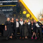 The team from St Austell Brewery celebrate winning the prestigious award