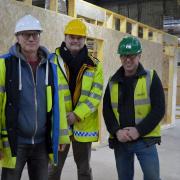 David Turnbull, Tim Grattan-Kane and project manager Jonathan Kearsley inside the building being transformed