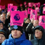 Everton fans protest against the Premier League after an independent commission docked them an initial 10 points for breaching the league’s financial rules (Nick Potts/PA)