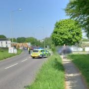 Police at the scene of the crash in Bickland Water Road
