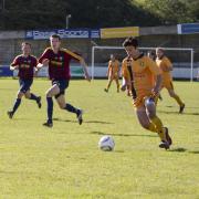 Harry Evans in action for Falmouth Town