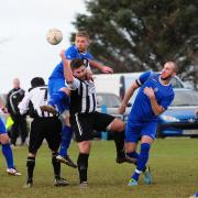Ben Stidwell battles to win a header. Picture: PHIL RUBERRY