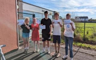 Students at Helston College with their A Level results
