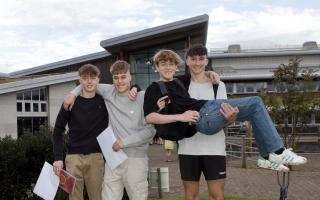 These students celebrate their results