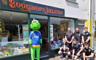 Dragon 'Dreckly' helped Helston Athletic director of football Steve Massey launch his latest book
